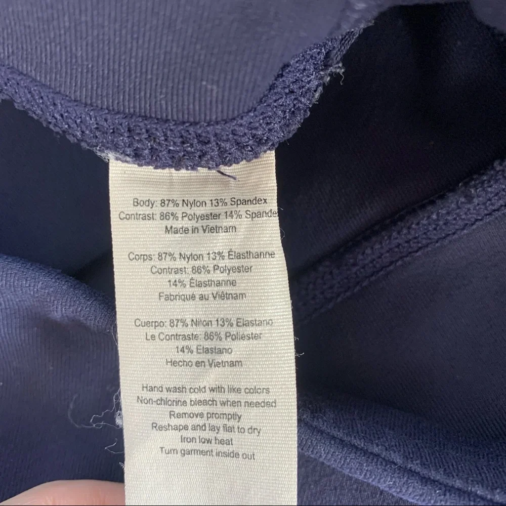 ALO Yoga Continuity Capri Legging In Rich Navy